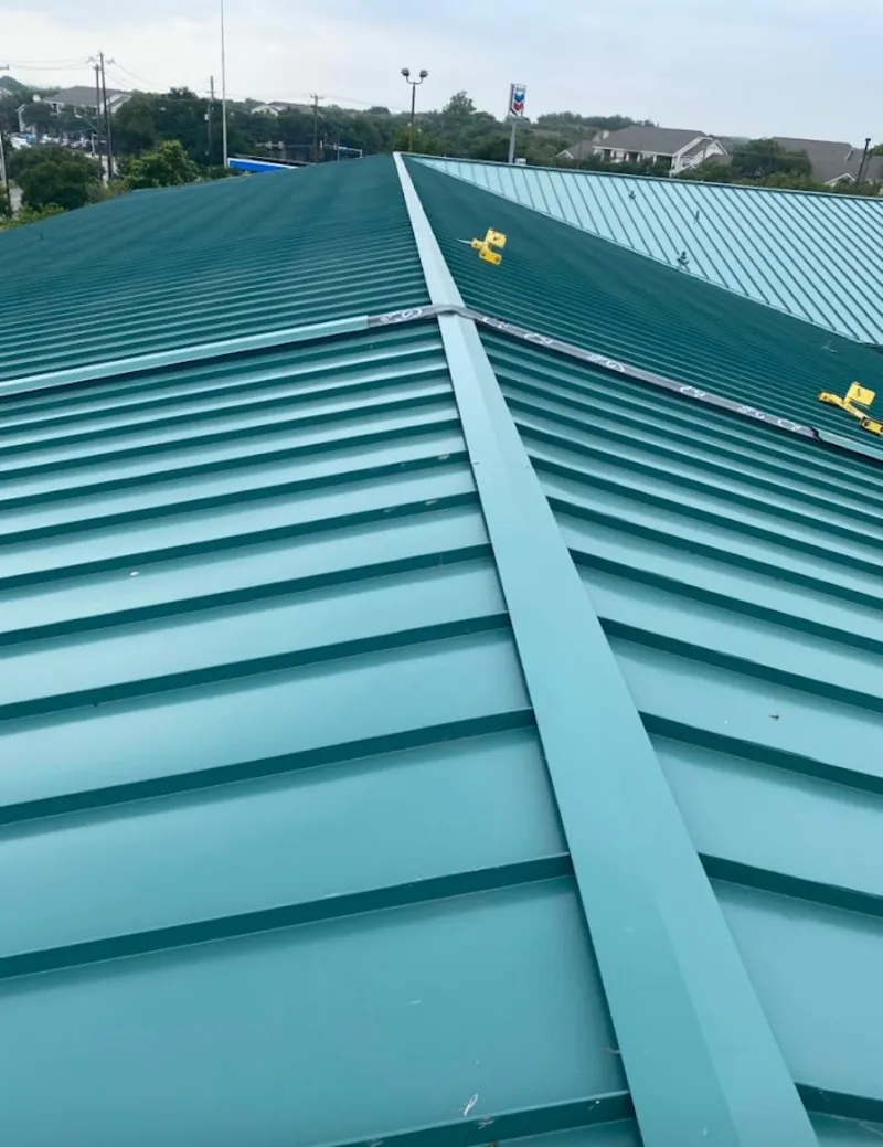 Green commercial metal roof ridge and valley for Metal Roof Repair in Montgomery